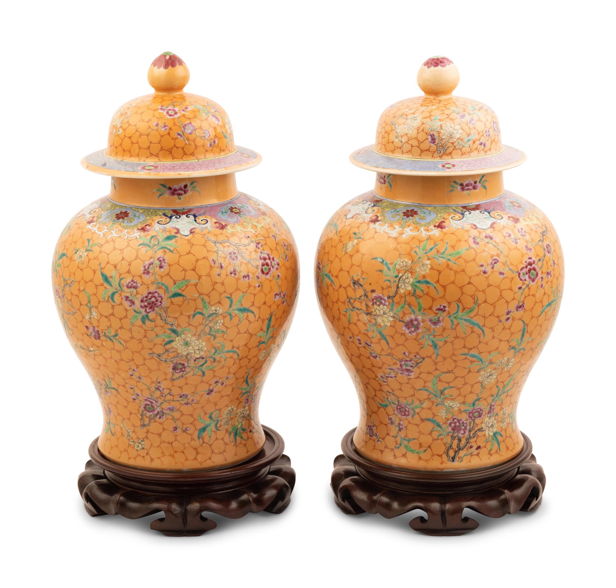 A Pair of Chinese Ochre Ground Famille Rose Porcelain Covered Jars