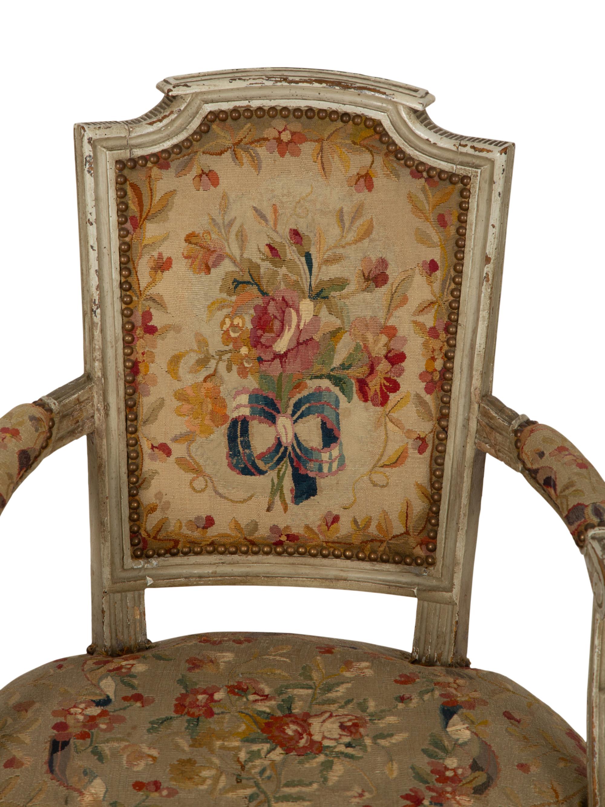 A Pair of Louis XVI Painted Fauteuils
