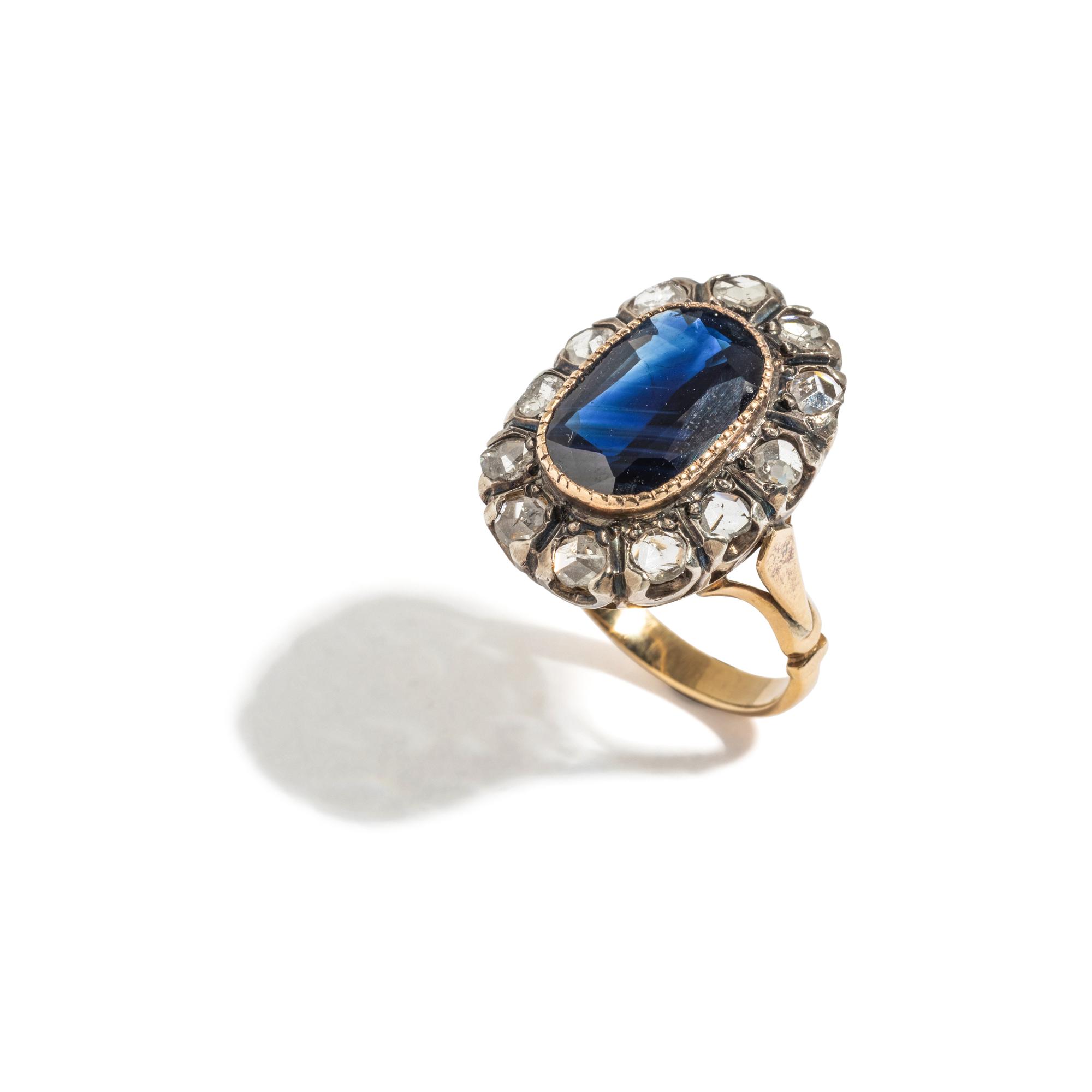 SILVER-TOPPED GOLD, SAPPHIRE AND DIAMOND RING