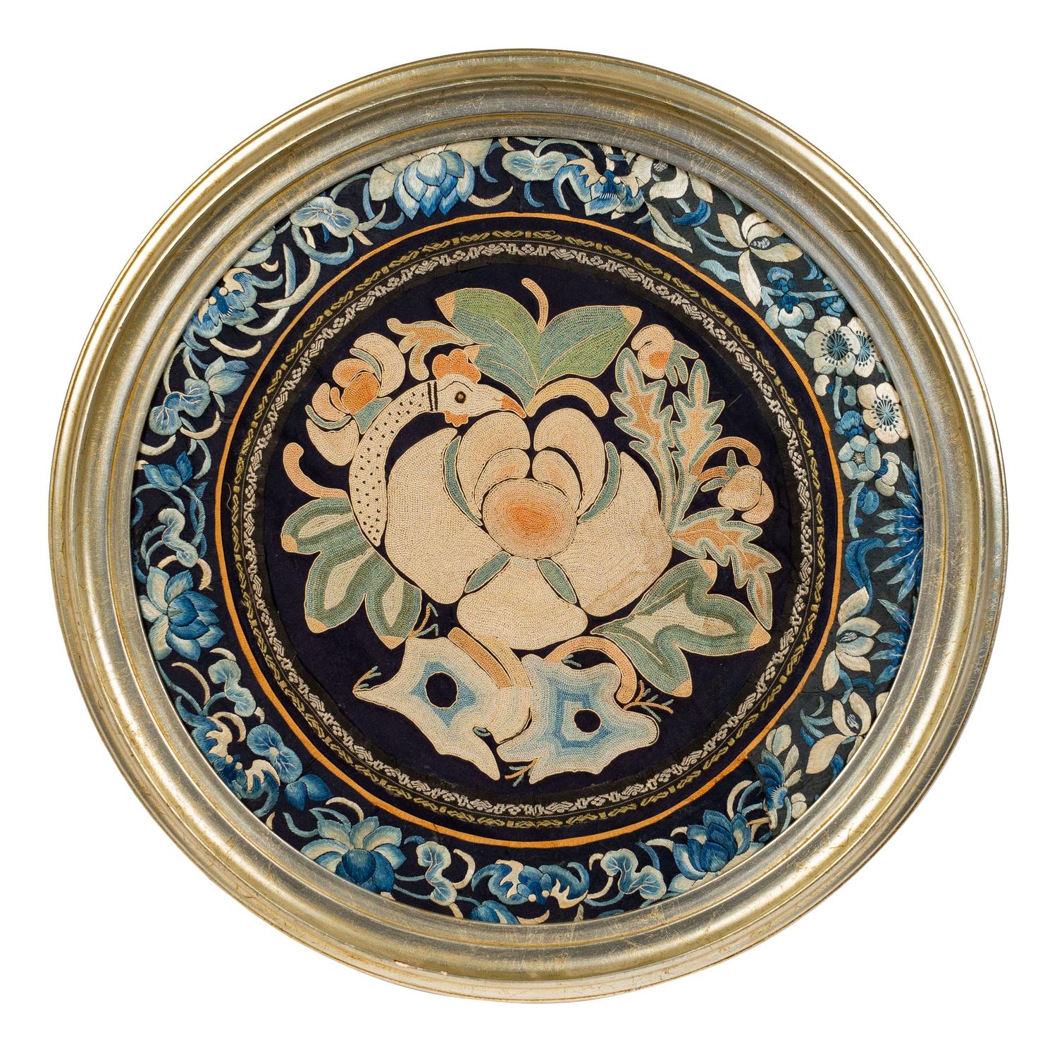 A Chinese Framed Blue Ground Embroidered Silk Panel Diameter 13 1/2 inches.