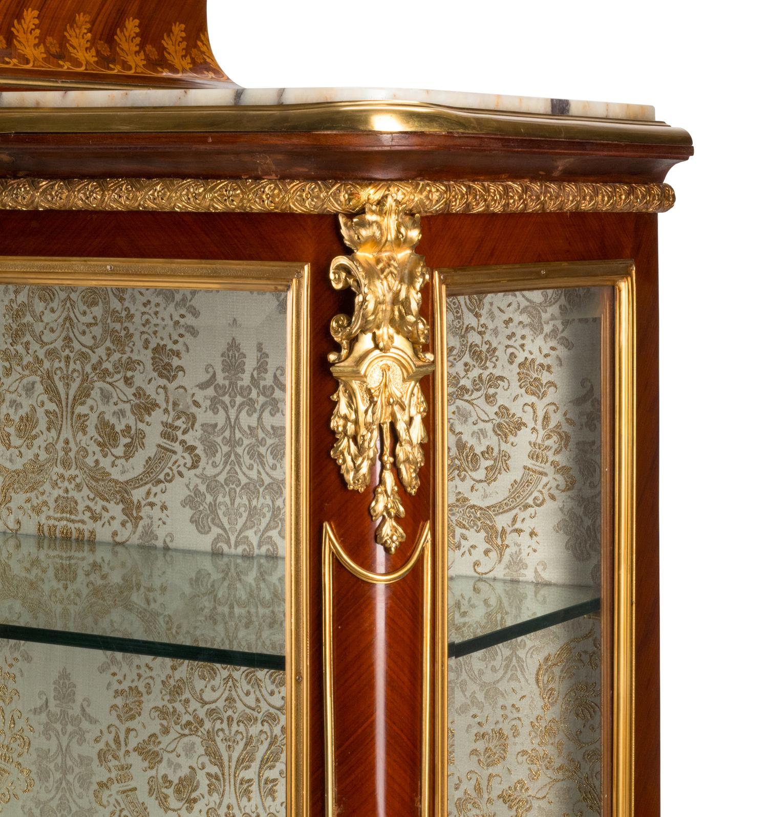 A Louis XV Style Gilt Bronze Mounted Marquetry Marble-Top Vitrine Cabinet