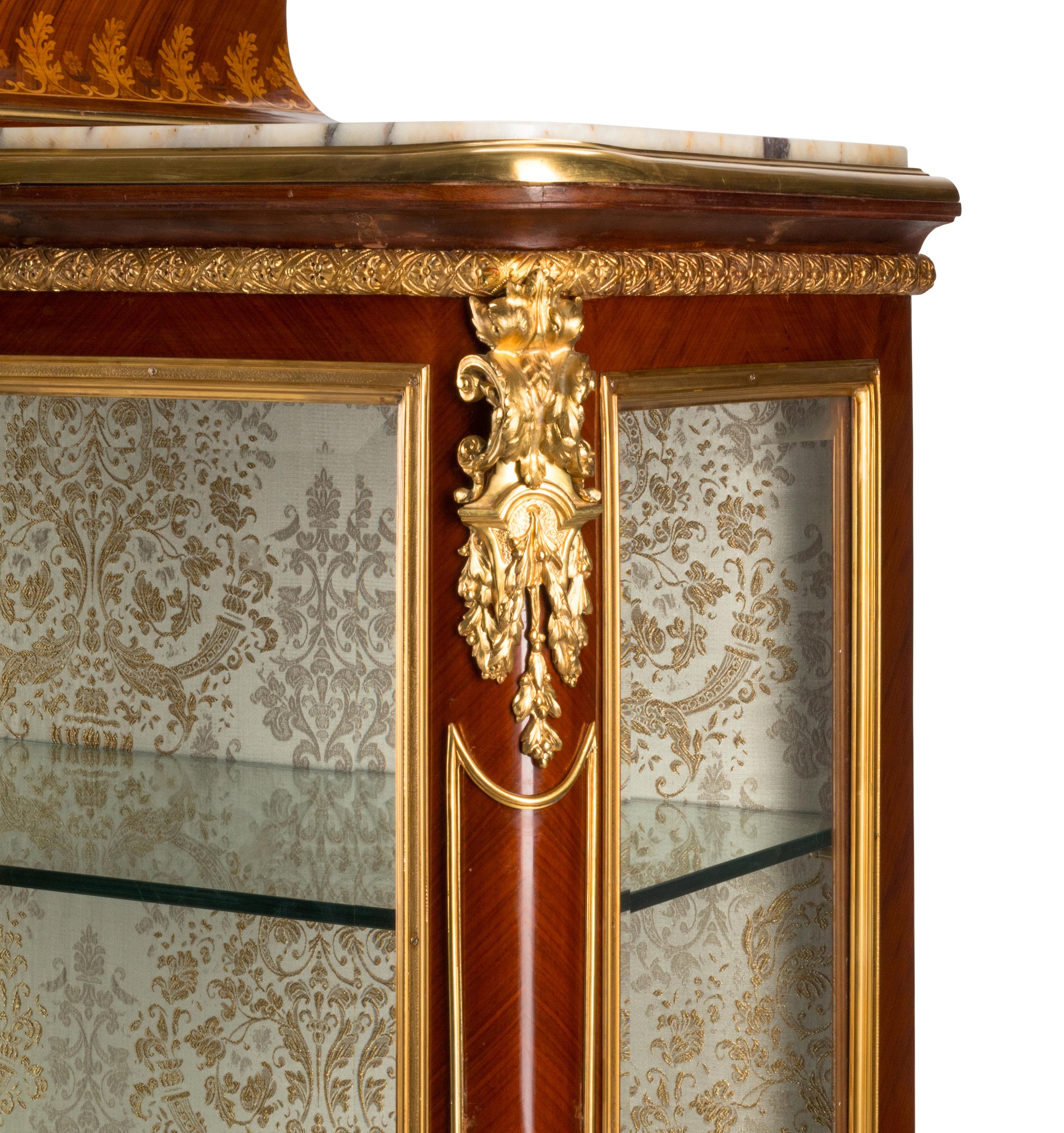 A Louis XV Style Gilt Bronze Mounted Marquetry Marble-Top Vitrine Cabinet