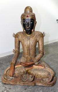 A Burmese Giltwood Seated Figure of Buddha Height 47 inches.