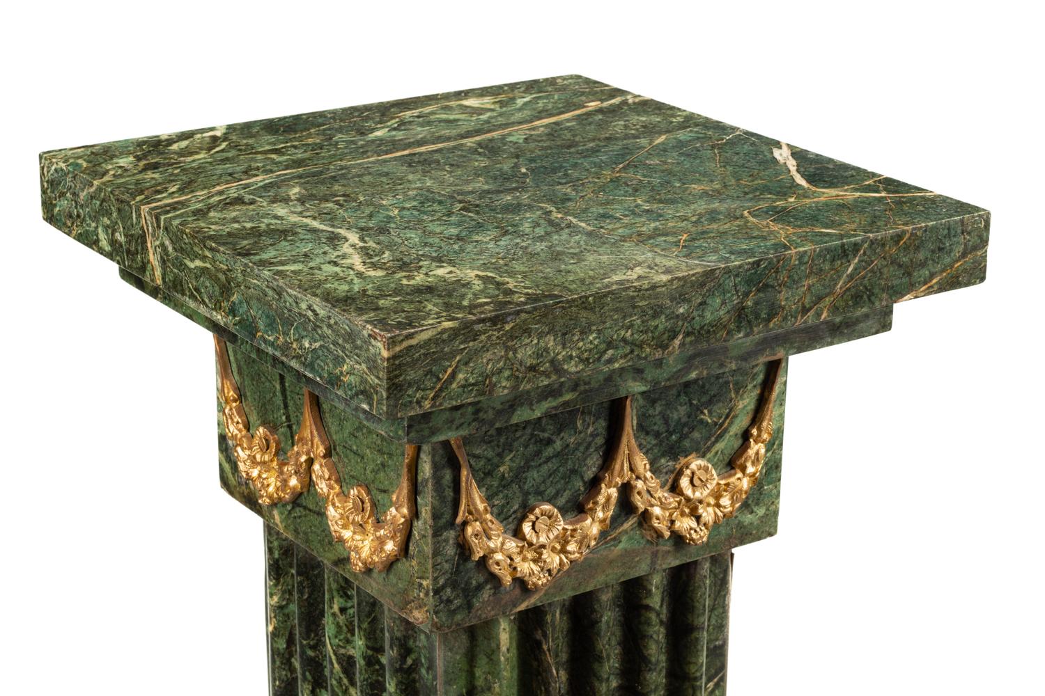 A Pair of Continental Gilt Bronze Mounted Marble Pedestals