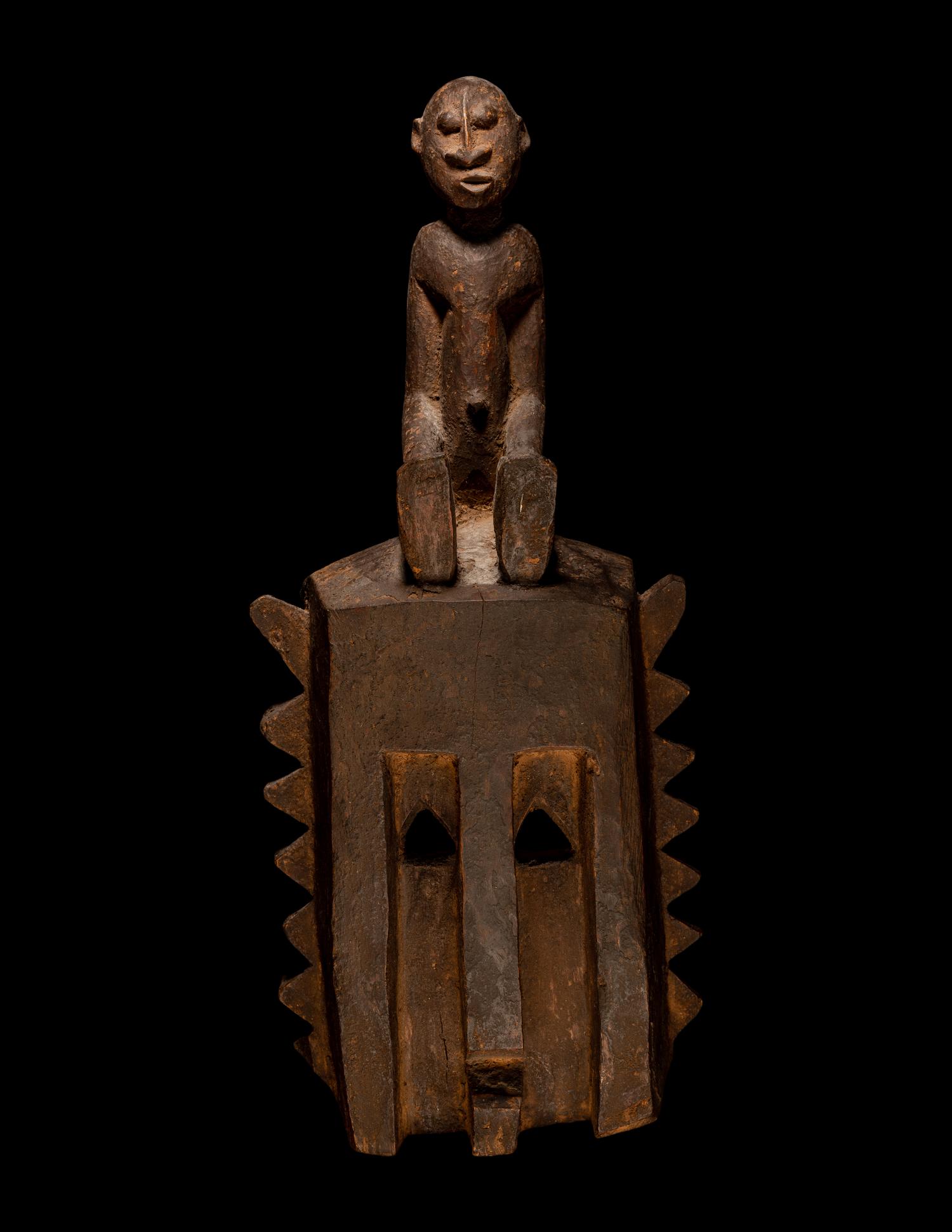 Two Dogon Wood Masks with Figures