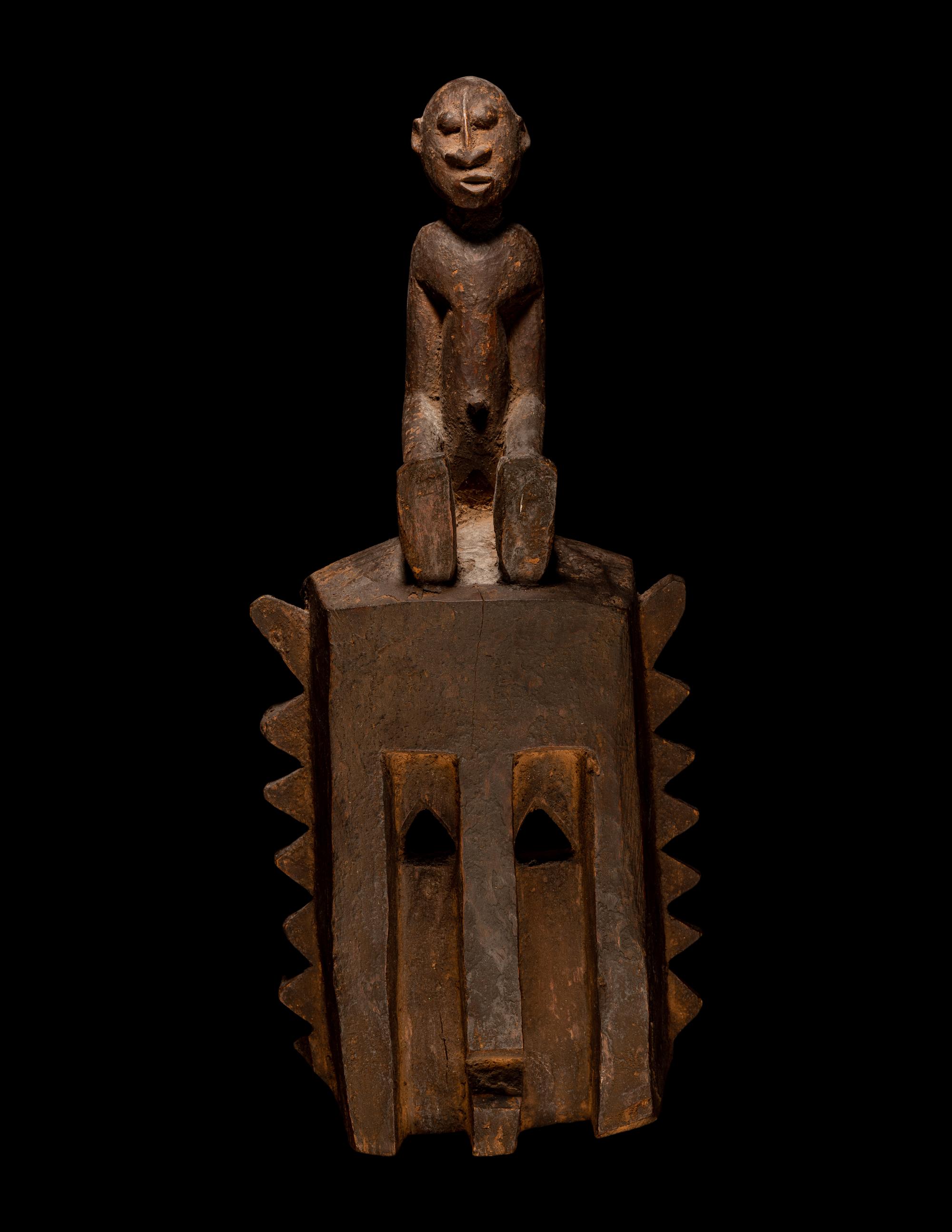 Two Dogon Wood Masks with Figures