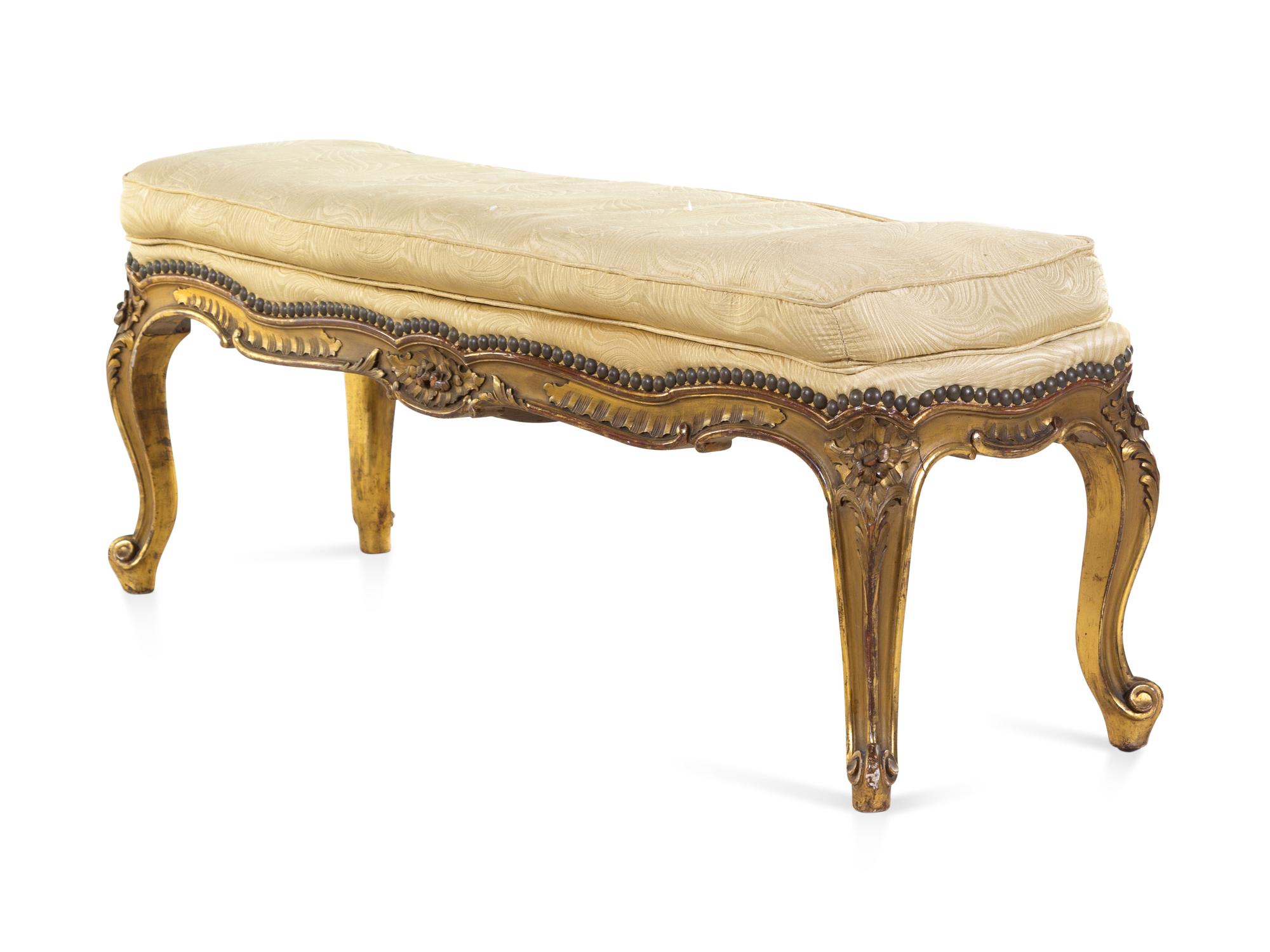 A Louis XV Style Carved Giltwood Window Bench