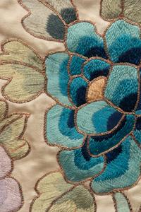 Two Chinese Cream Ground Embroidered Silk Panels