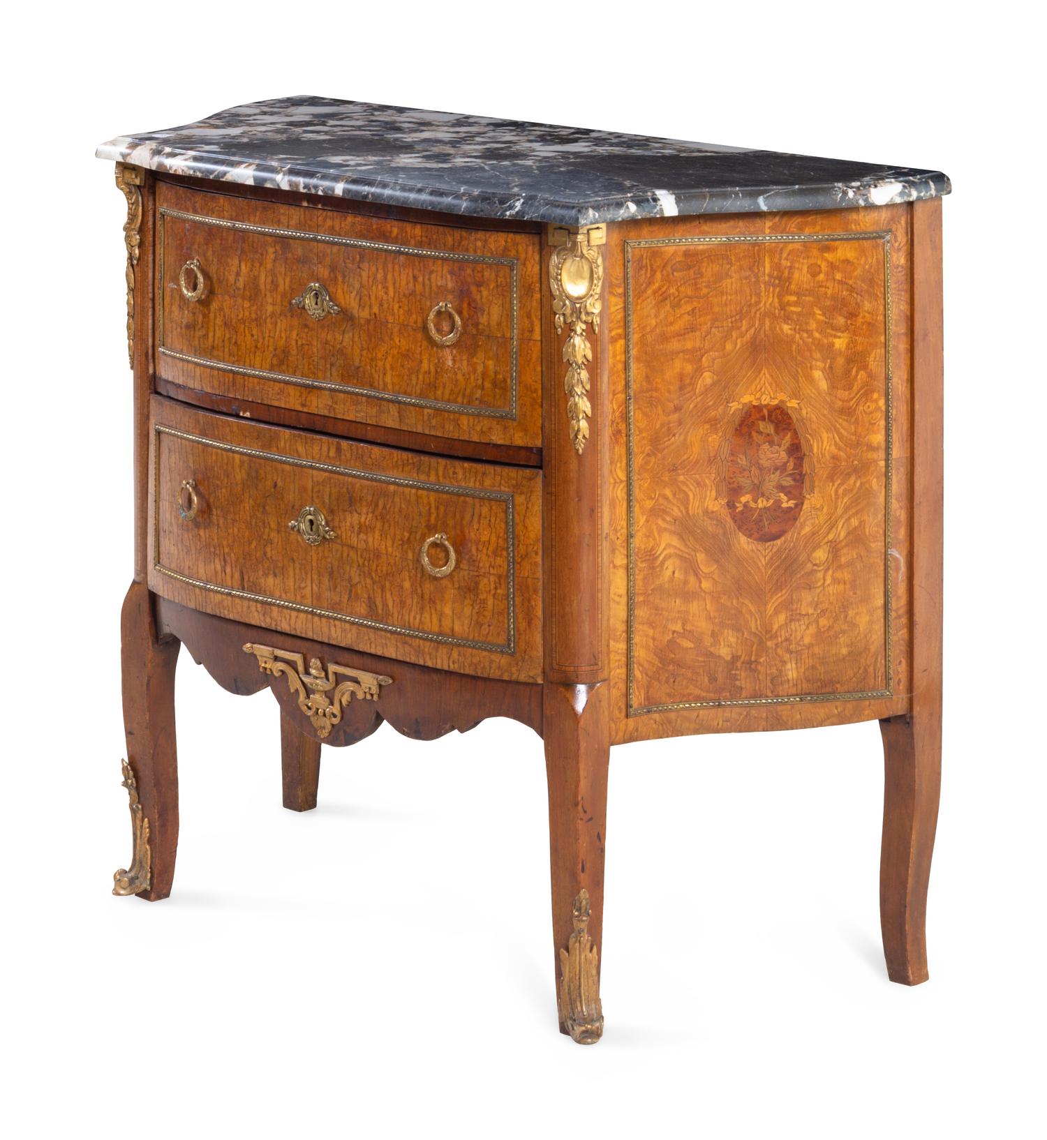 A Louis XV/XVI Transitional Style Gilt Bronze Mounted Marquetry Marble-Top Commode