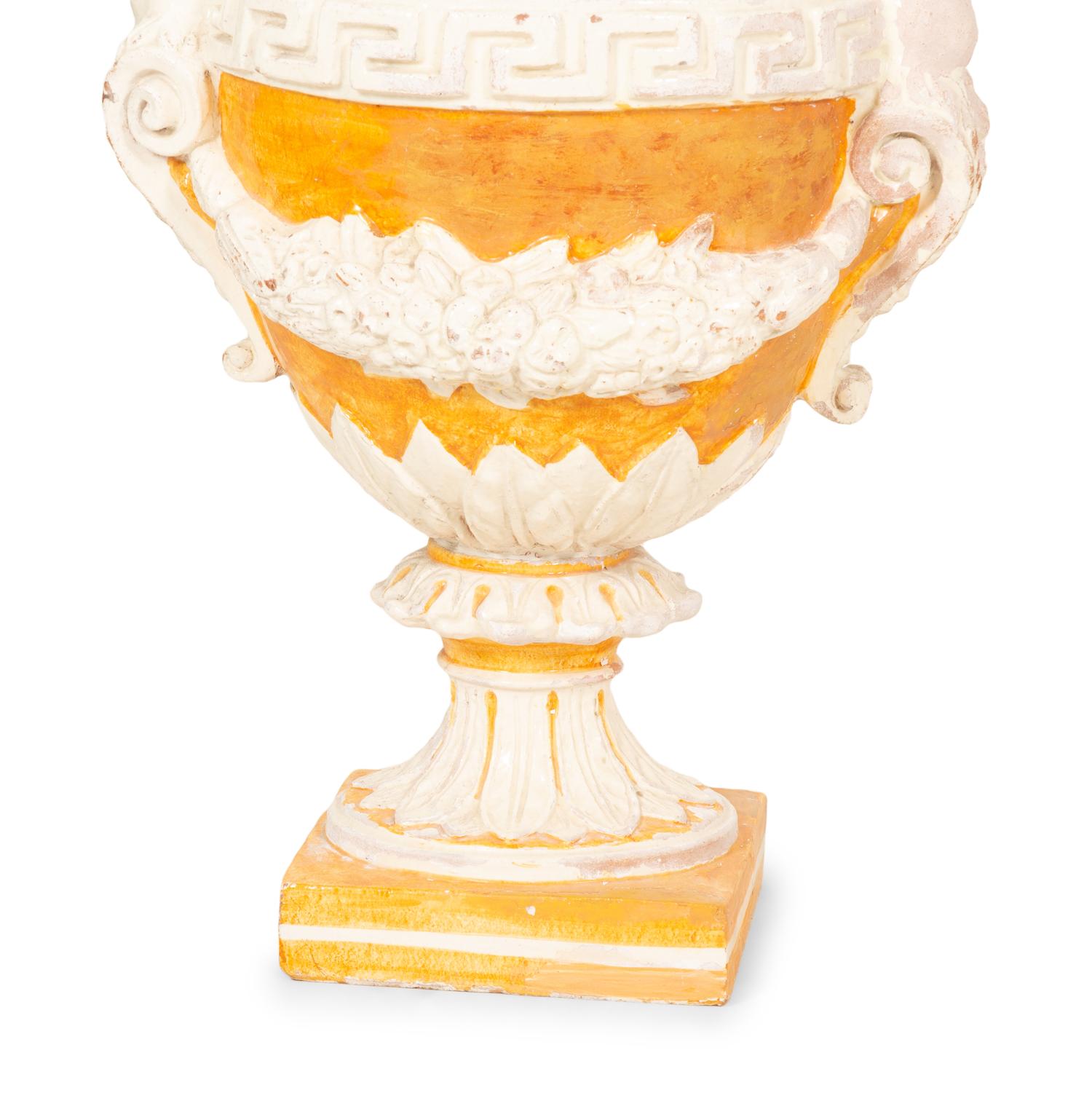 A Pair of Italian Glazed Terracotta Covered Urns