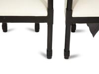 A Pair of Continental Ebonized Armchairs