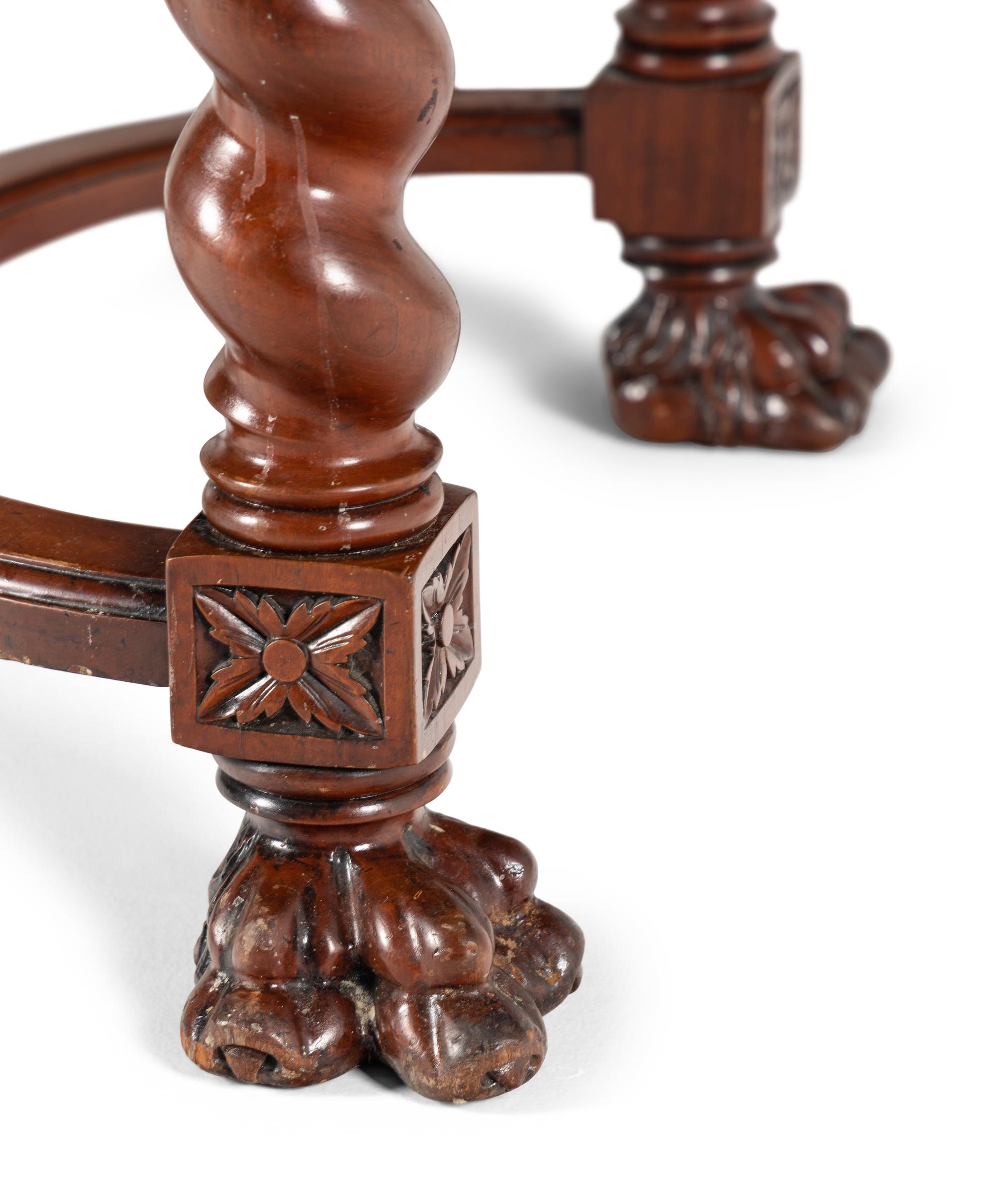 A Renaissance Style Carved Walnut Table