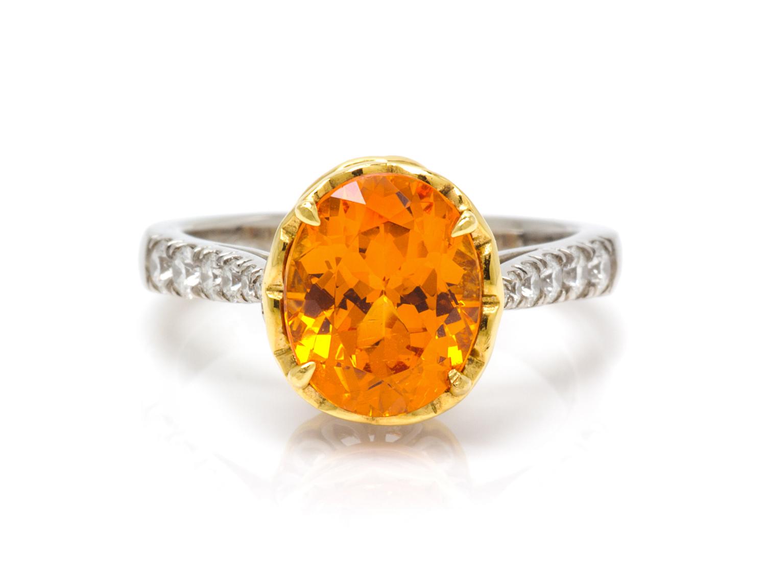 A Platinum, 18 Karat Yellow Gold, Spessartite and Diamond Ring, Richard Krementz, 5.40 dwts.