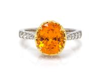 A Platinum, 18 Karat Yellow Gold, Spessartite and Diamond Ring, Richard Krementz, 5.40 dwts.