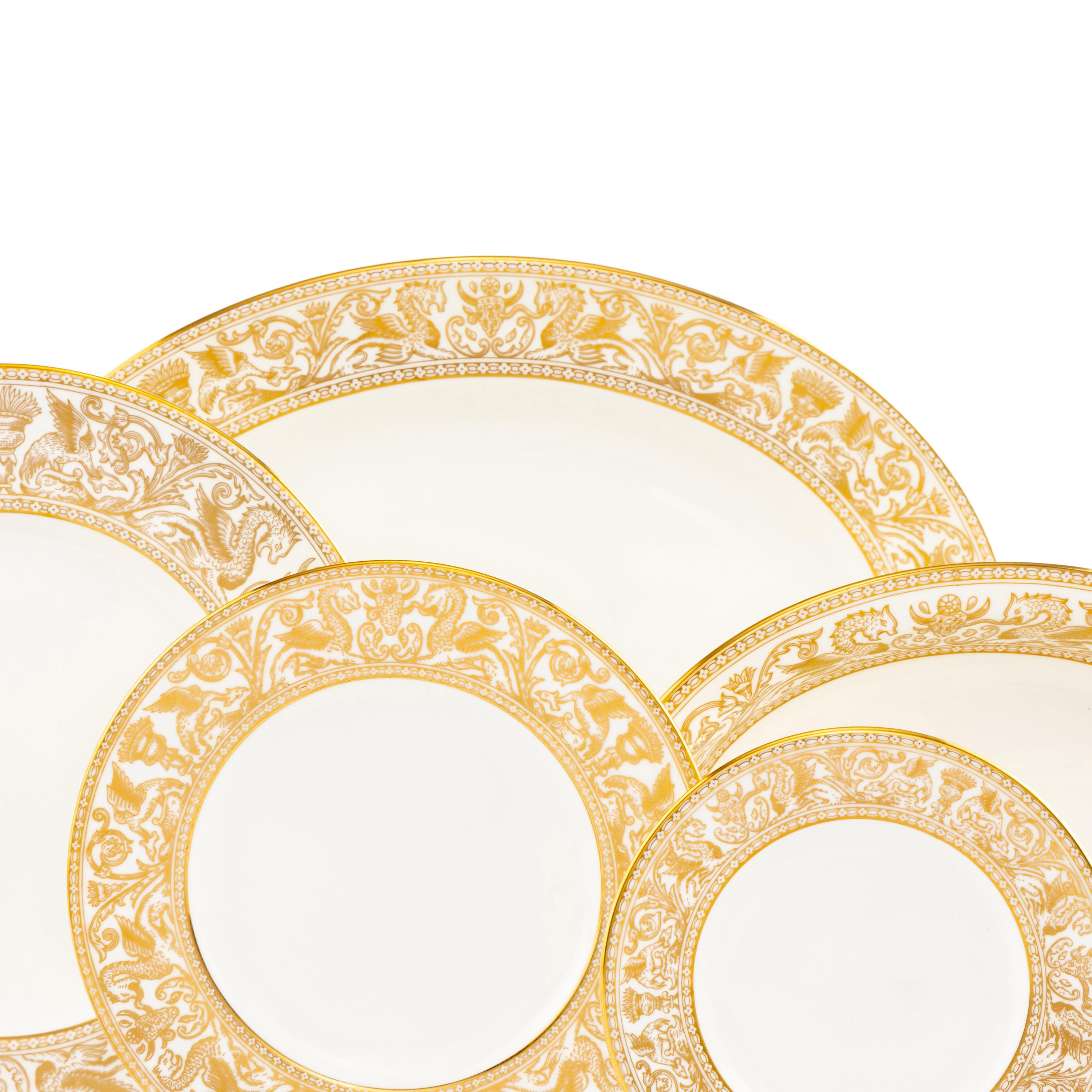 A Wedgwood Gold Florentine Porcelain Dinner Service