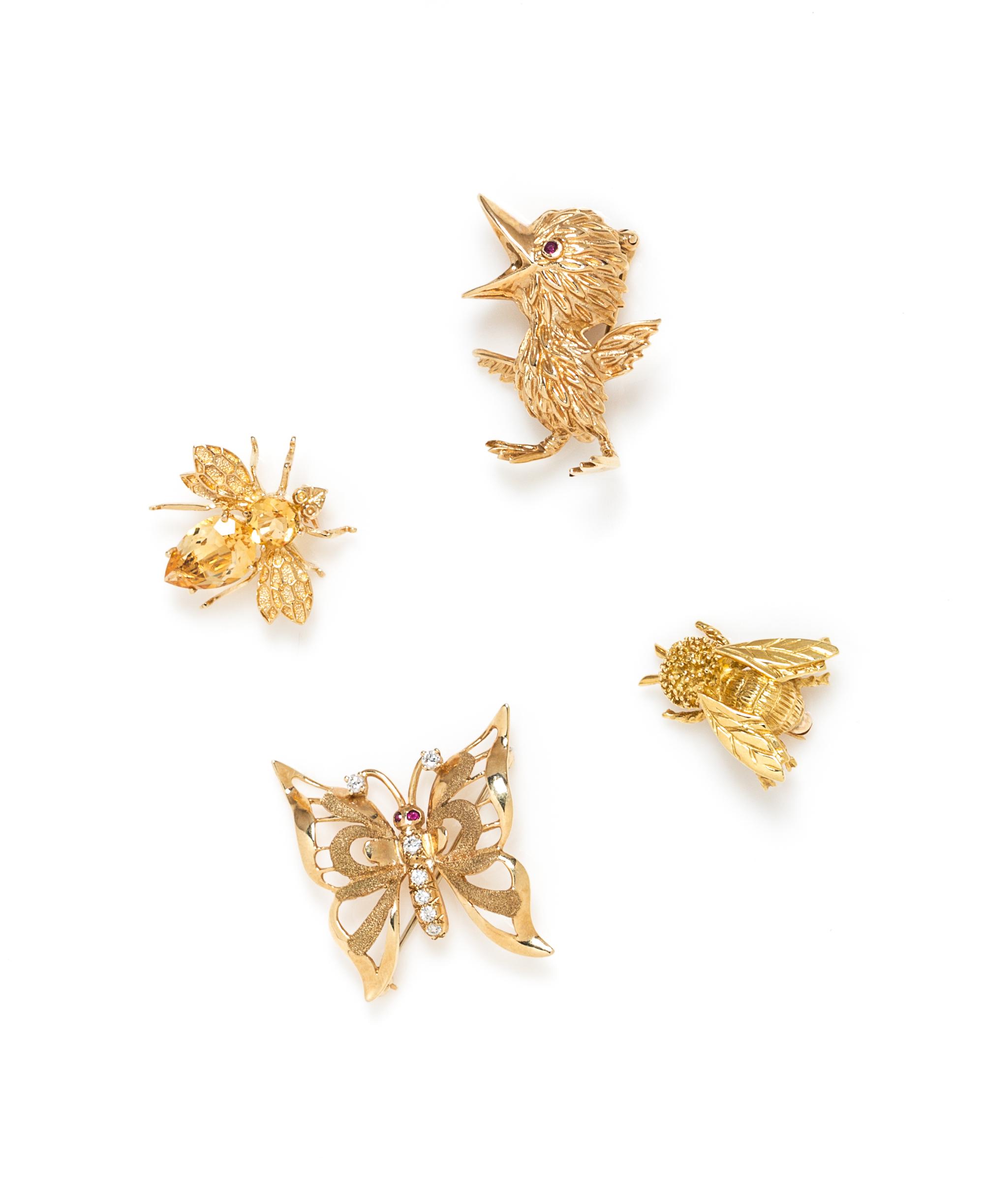 A Collection of Yellow Gold Brooches, 15.40 dwts.