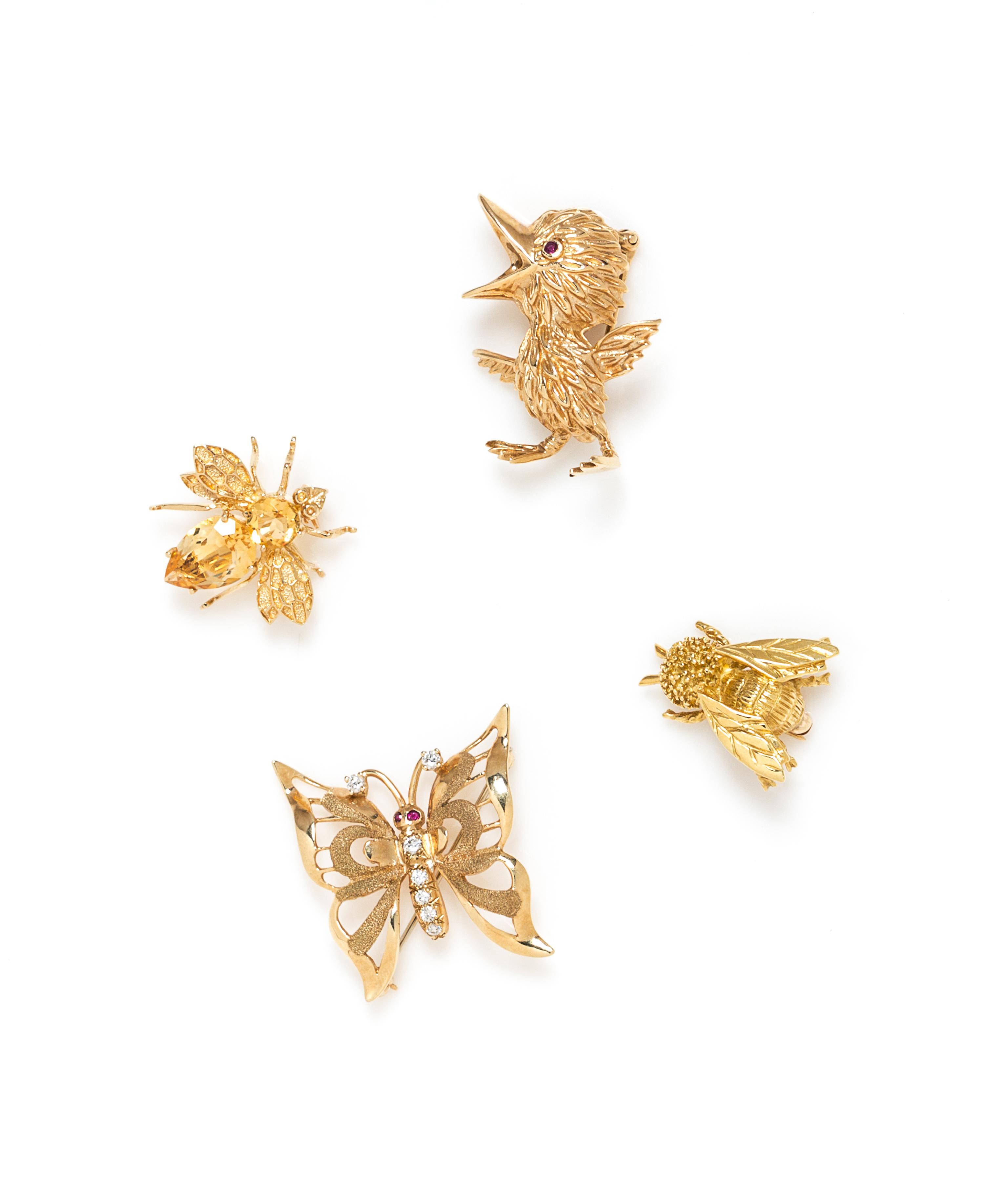 A Collection of Yellow Gold Brooches, 15.40 dwts.