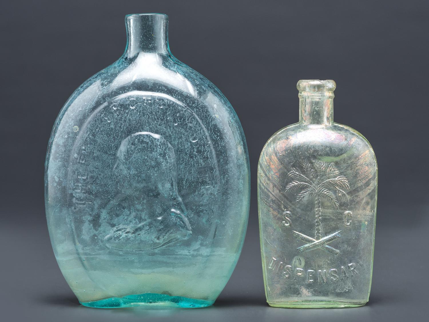 A Washington-Taylor Portrait Flask and South Carolina Dispensary Flask