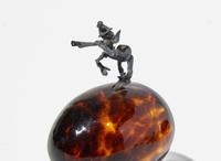 A group of five sterling silver, silver gilt, enamel, and semiprecious eggs, various makers, 20th century