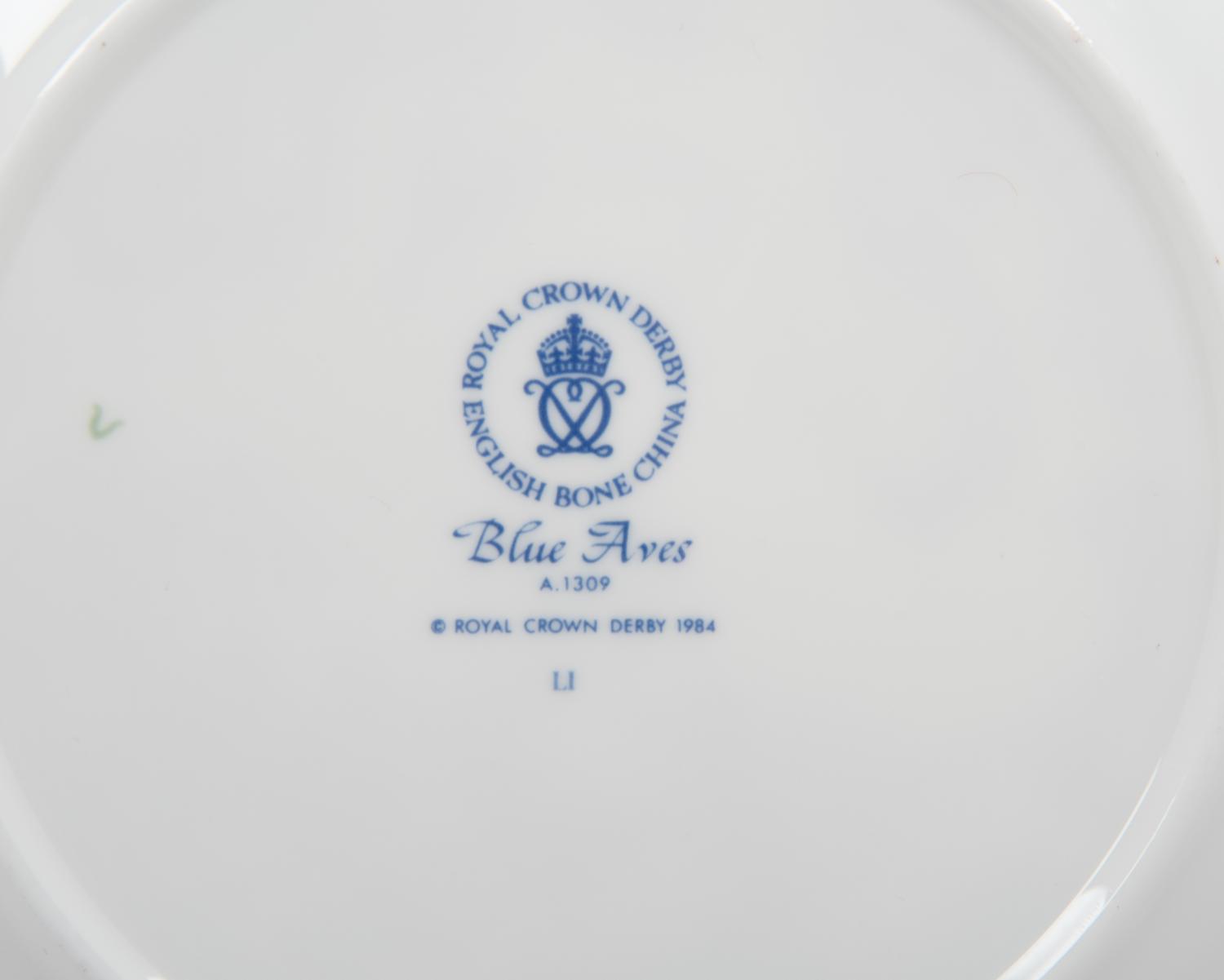 A Royal Crown Derby Porcelain Blue Aves Dinner Service