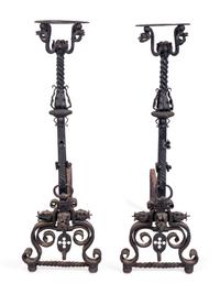 A Pair of Renaissance Style Wrought-Iron Andirons — IN THE MANNER OF SAMUEL YELLIN, EARLY 20TH CENTURY