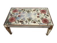 An Eglomisé Mirrored Coffee Table with Floral Decoration