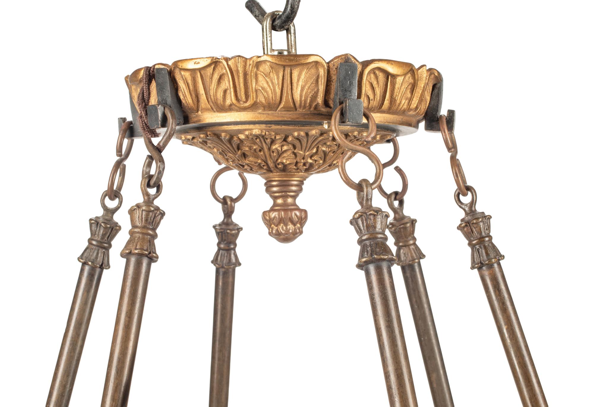 An Empire Style Bronze and Tôle Six-Light Chandelier