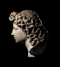 A Roman Marble Head of a Triton