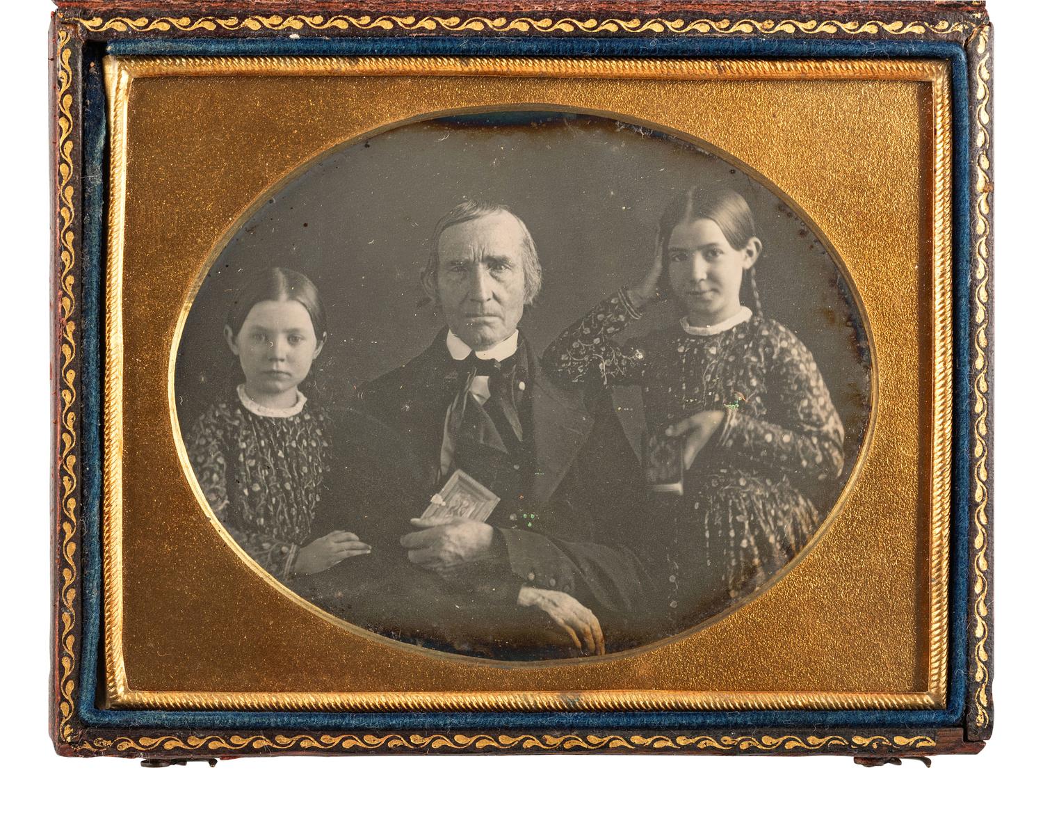 [EARLY PHOTOGRAPHY]. 4 daguerreotype and ambrotype portraits of subjects with images.