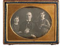 [EARLY PHOTOGRAPHY]. 4 daguerreotype and ambrotype portraits of subjects with images.