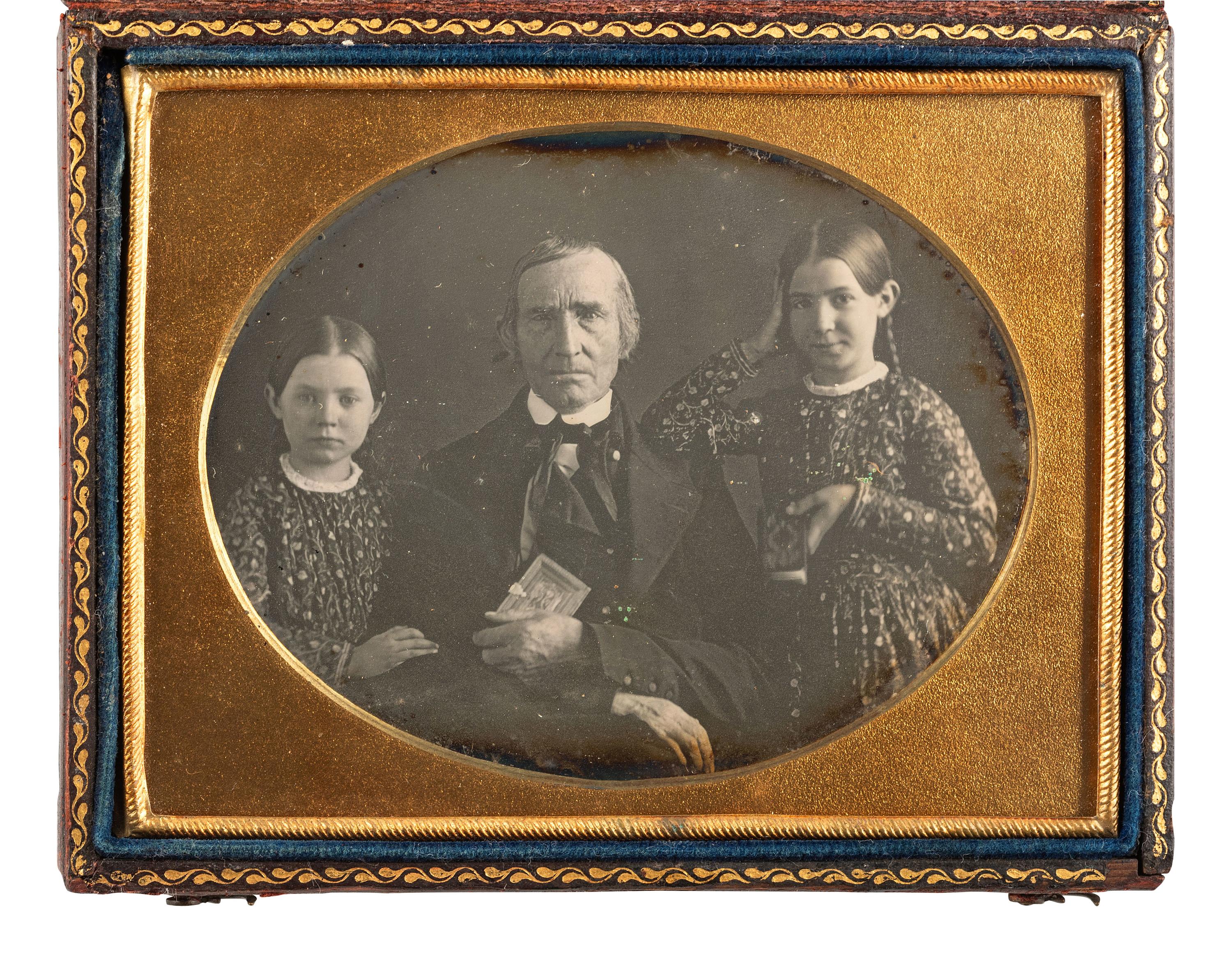 [EARLY PHOTOGRAPHY]. 4 daguerreotype and ambrotype portraits of subjects with images.