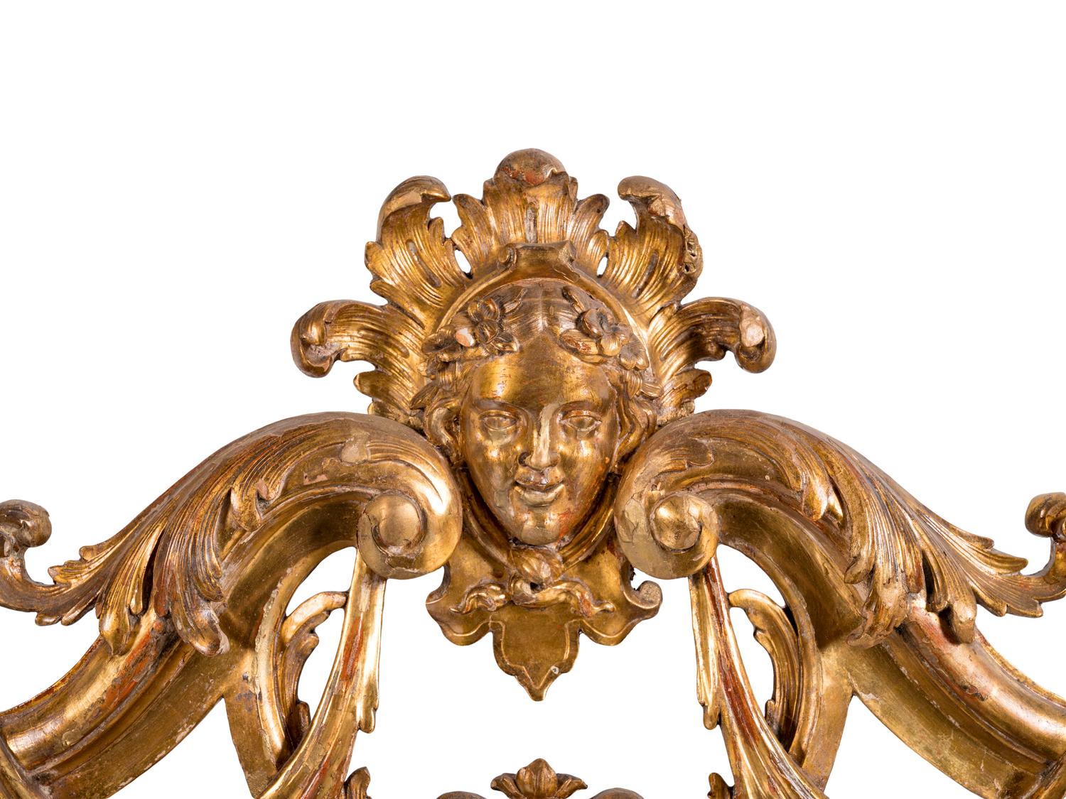 An Italian Baroque Style Giltwood Mirror