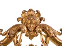 An Italian Baroque Style Giltwood Mirror