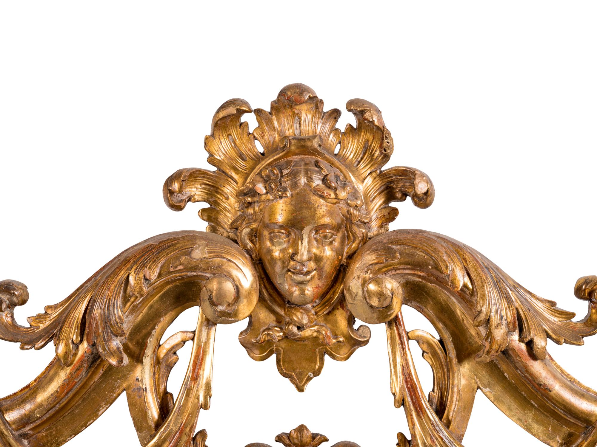 An Italian Baroque Style Giltwood Mirror