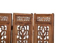 A Chinese Carved Hardwood Four-Panel Floor Screen