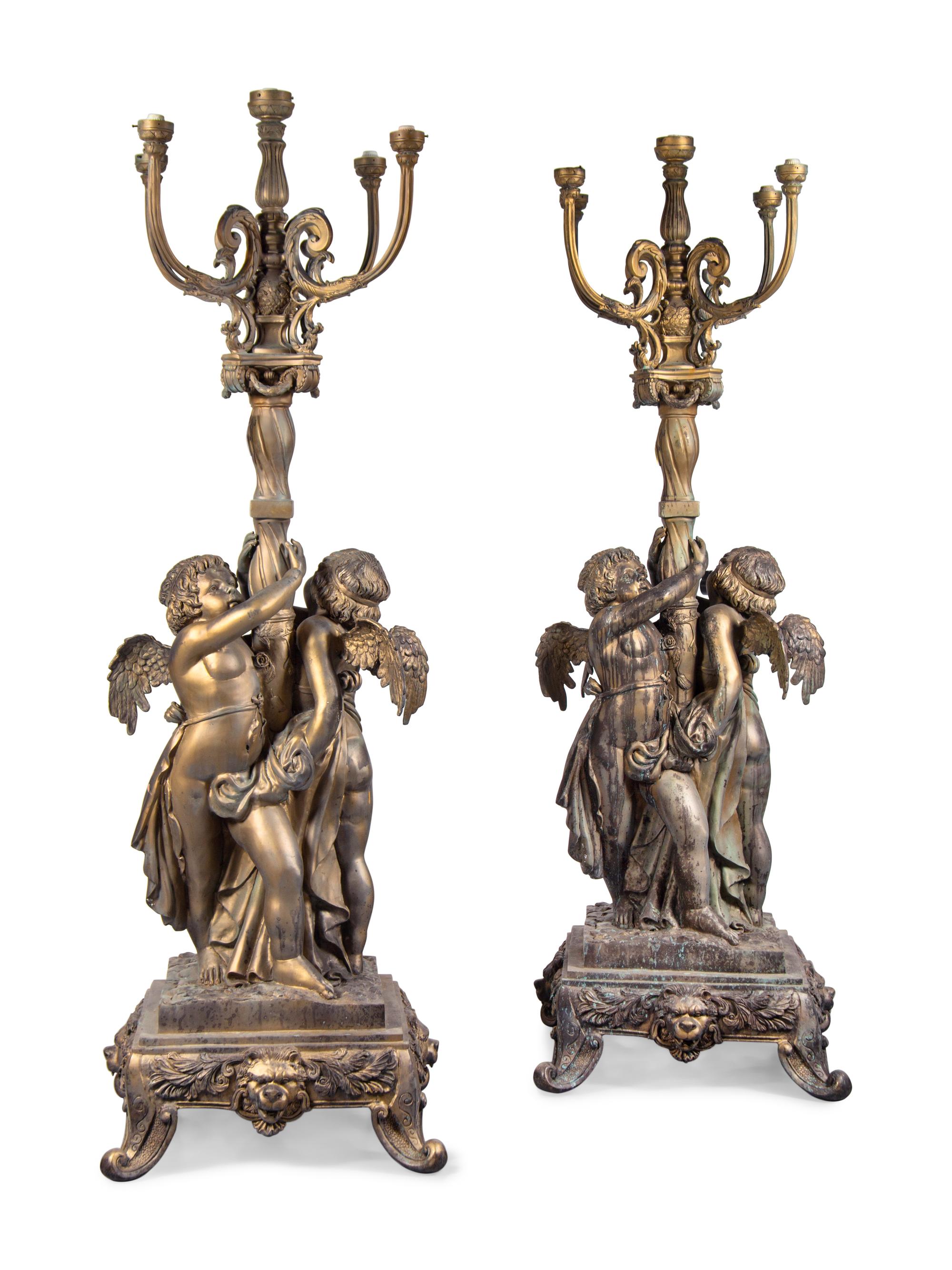 A Pair of Neoclassical Style Parcel Gilt Cast Metal Five-Light Torchères