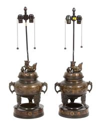 A Pair of Asian Bronze Censers with Foo Dog Finials Overall height 32 inches. — 20TH CENTURY