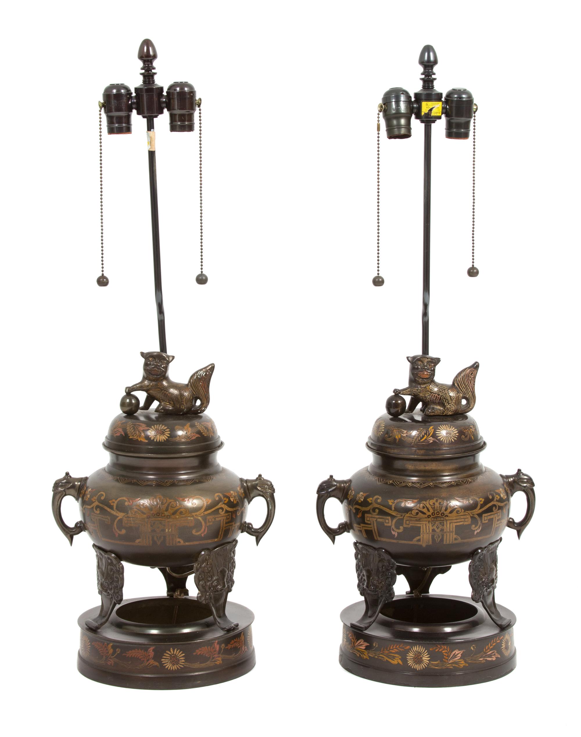 A Pair of Asian Bronze Censers with Foo Dog Finials Overall height 32 inches. — 20TH CENTURY