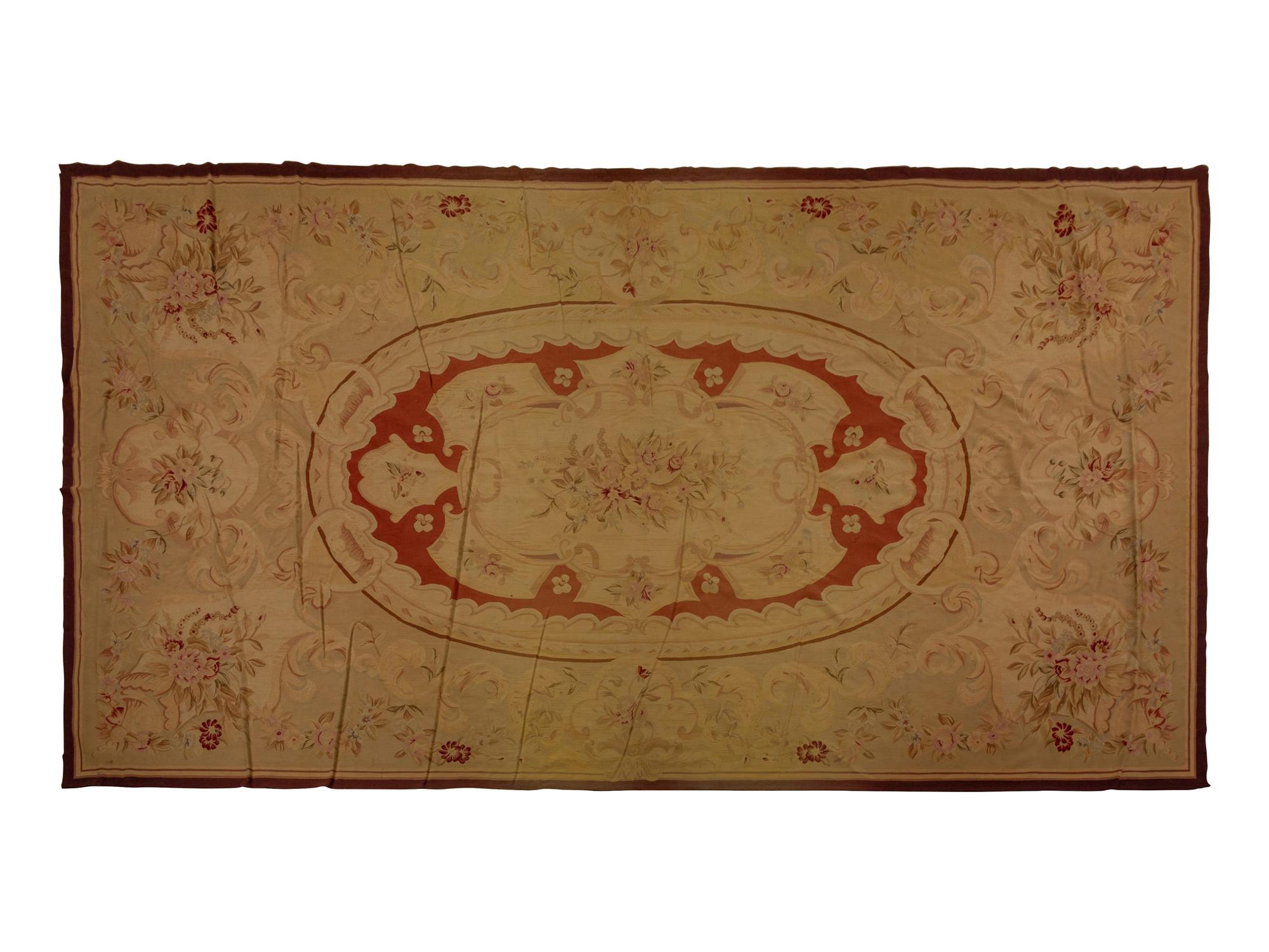 A Pair of Aubusson Style Rugs