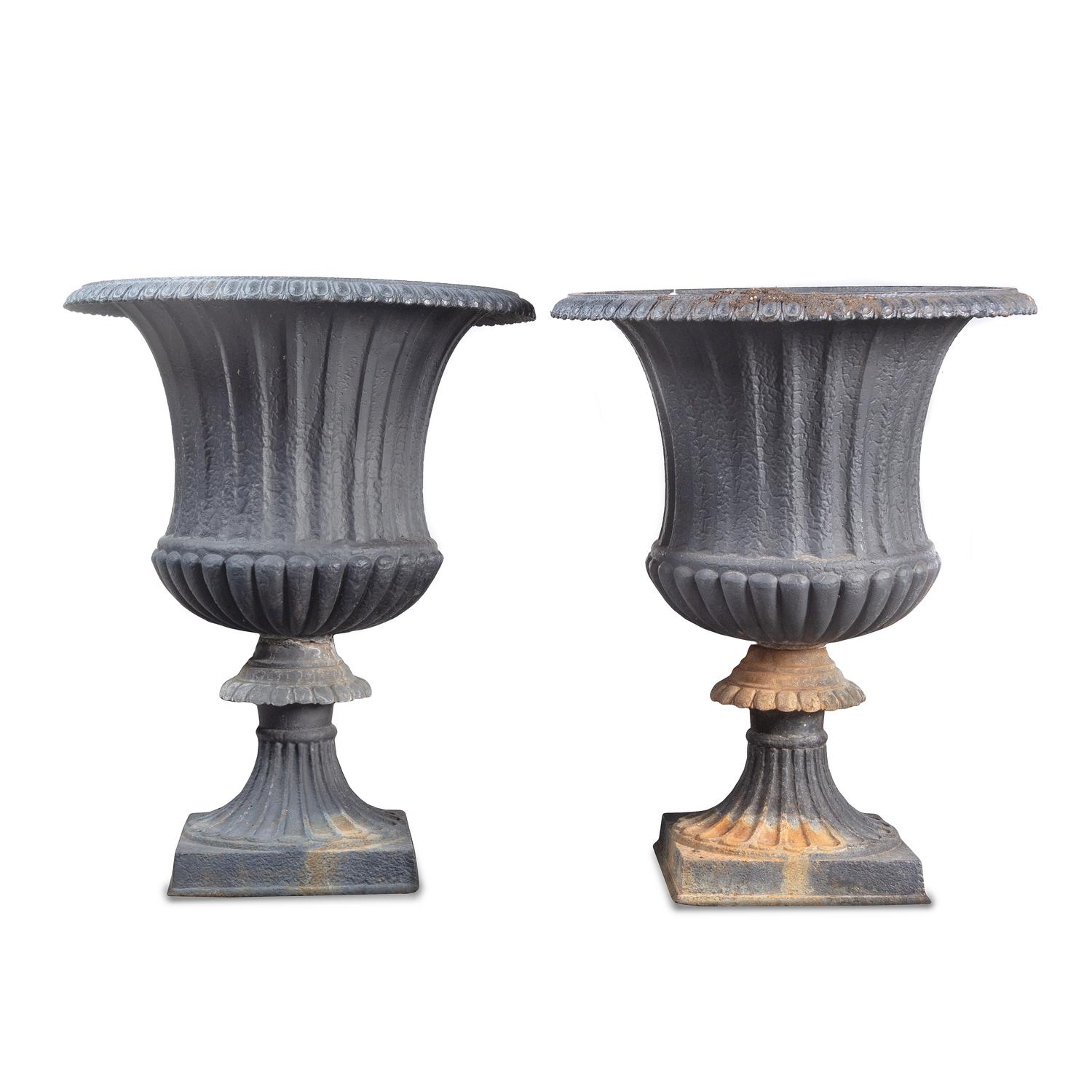 A Pair of Cast Iron Garden Urns