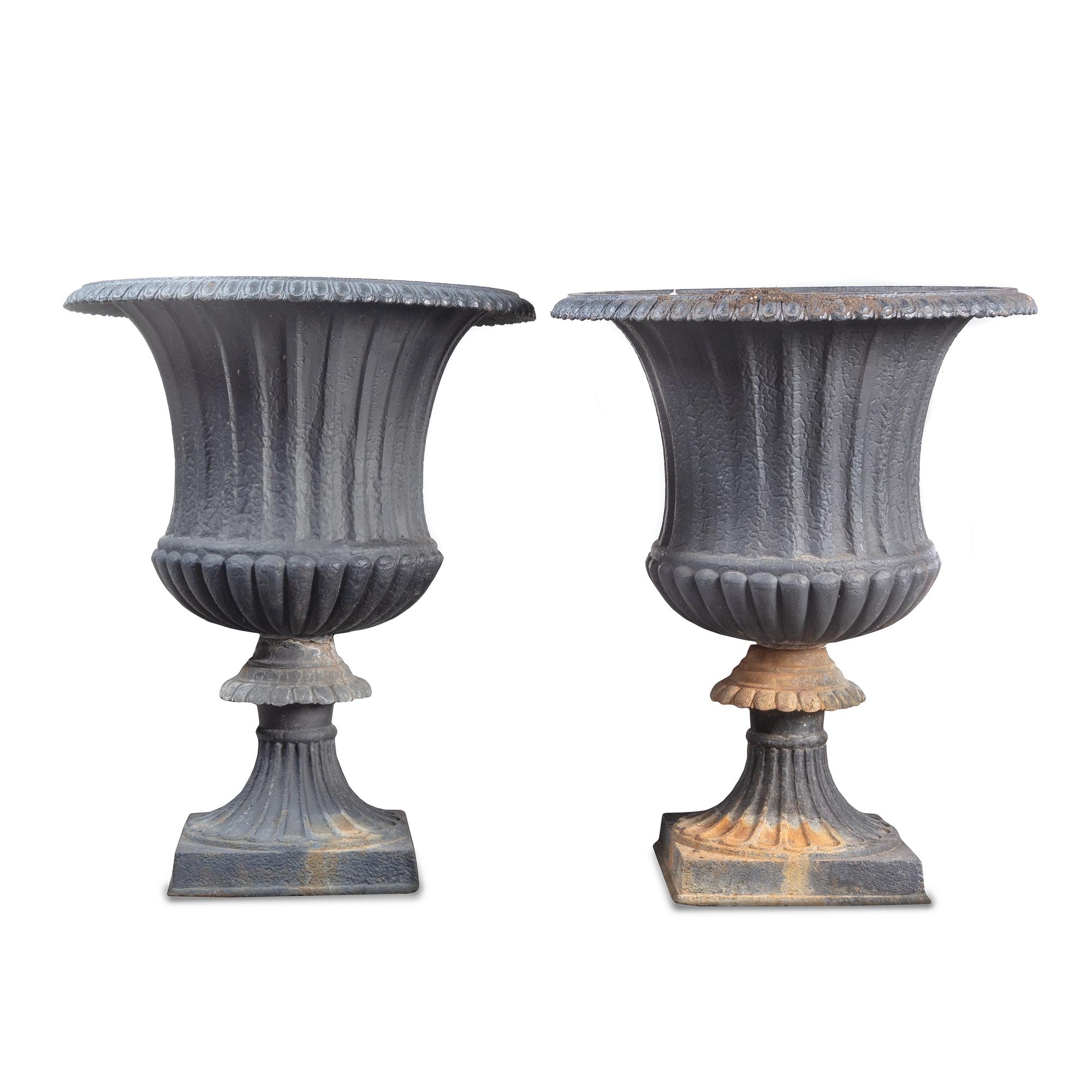 A Pair of Cast Iron Garden Urns