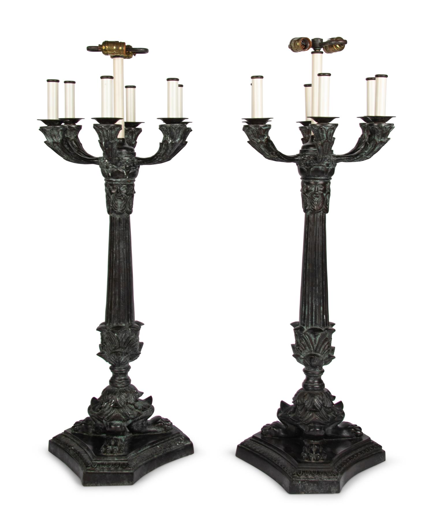A Pair of Empire Style Patinated Cast Metal Lamps