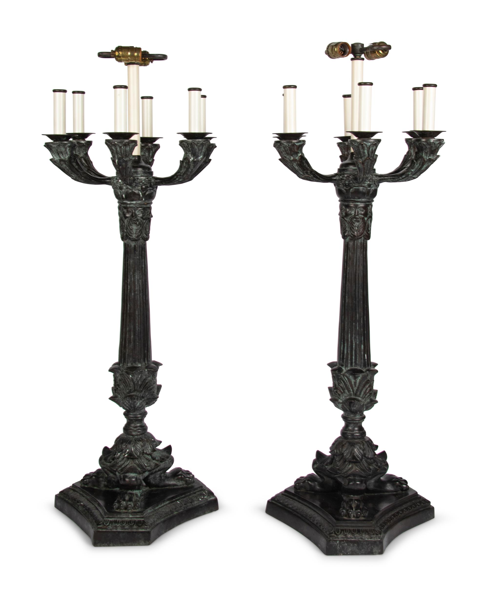 A Pair of Empire Style Patinated Cast Metal Lamps
