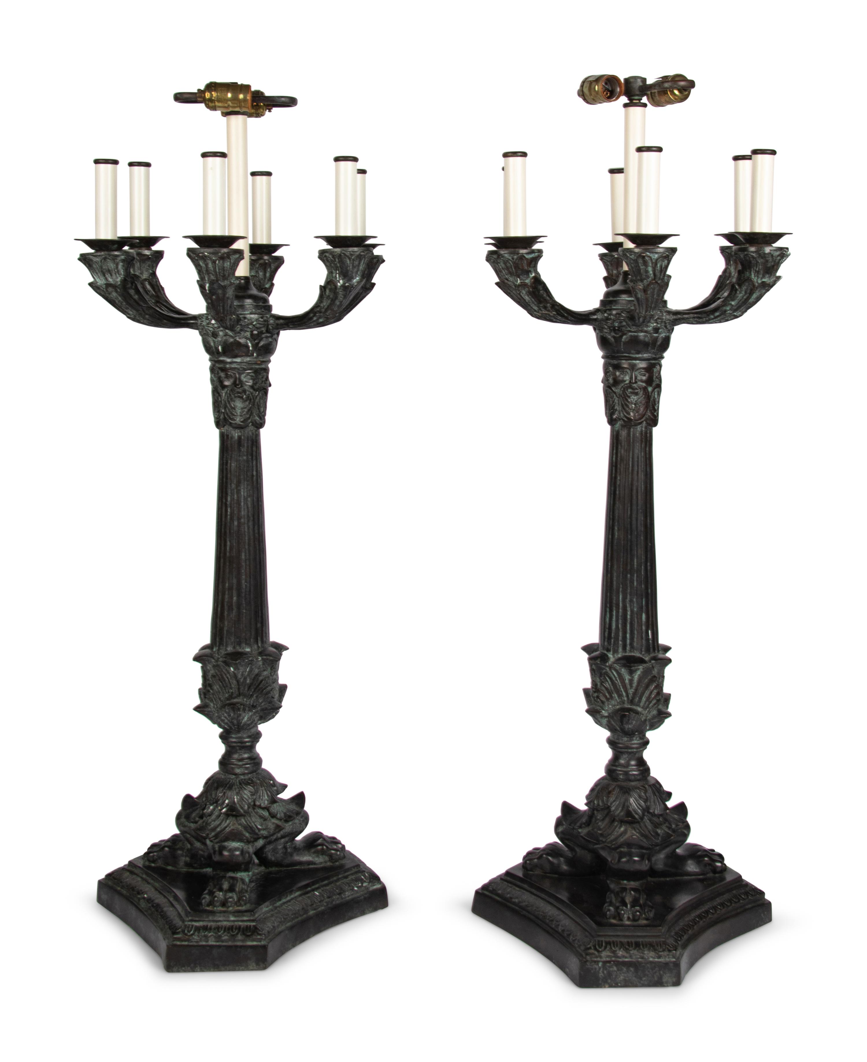 A Pair of Empire Style Patinated Cast Metal Lamps
