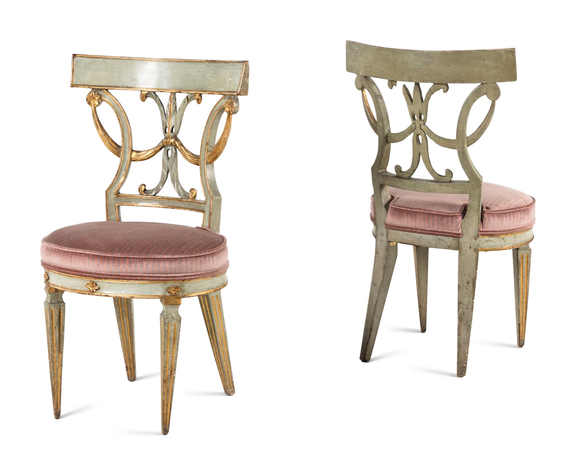 A Pair of Italian Neoclassical Blue Painted and Parcel Gilt Side Chairs