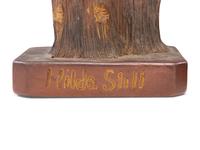 A Pair of Sewer Tile Candle Holders