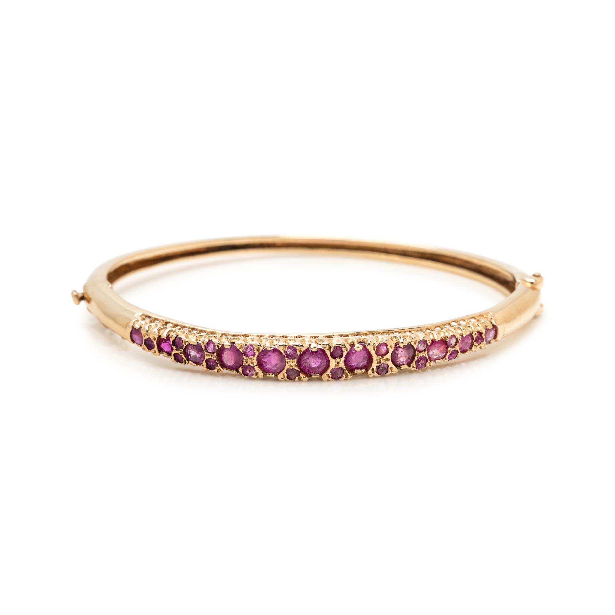 YELLOW GOLD AND RUBY BANGLE BRACELET