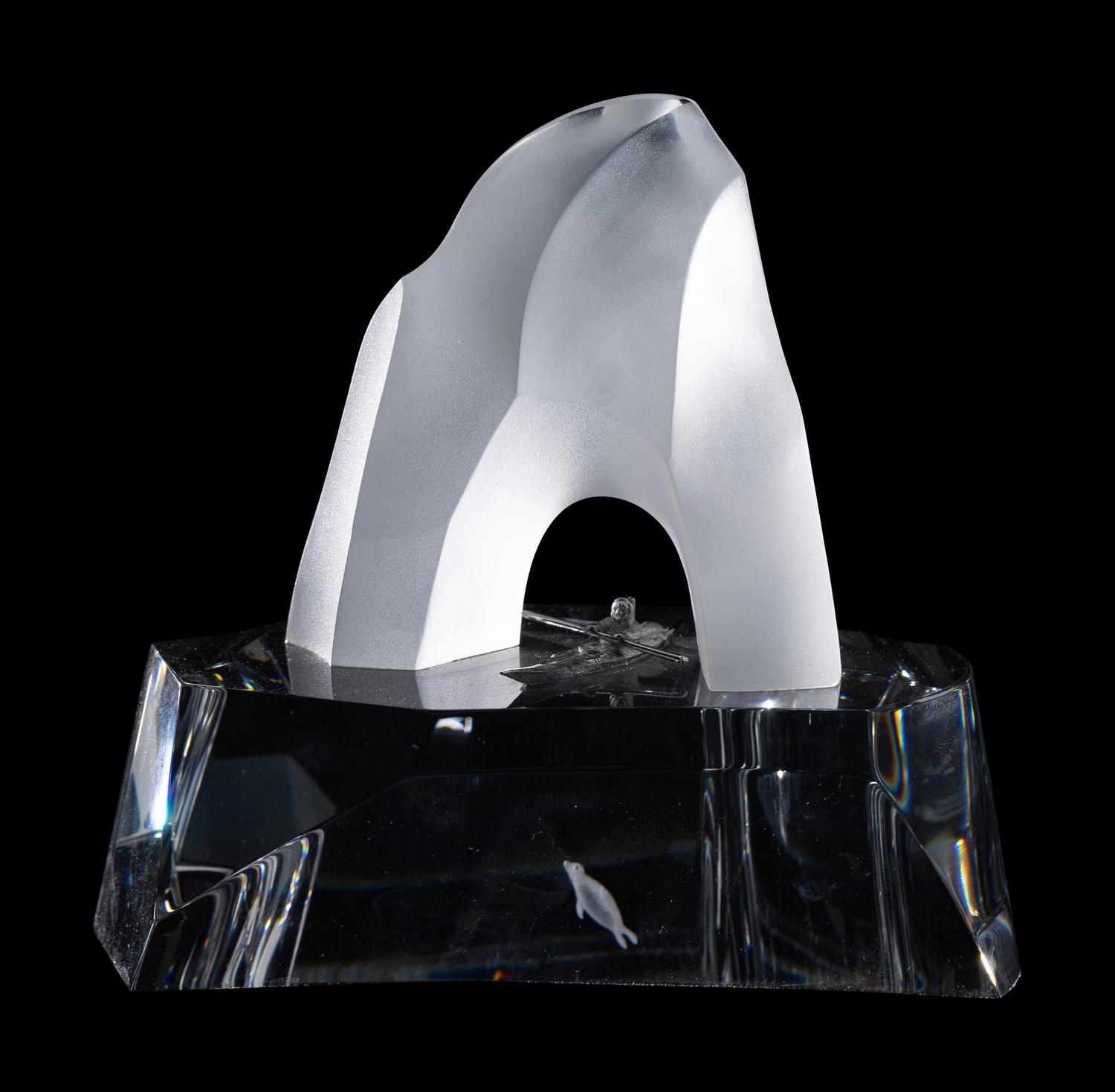 A Steuben Glass and Silver Ice Penguin Sculpture