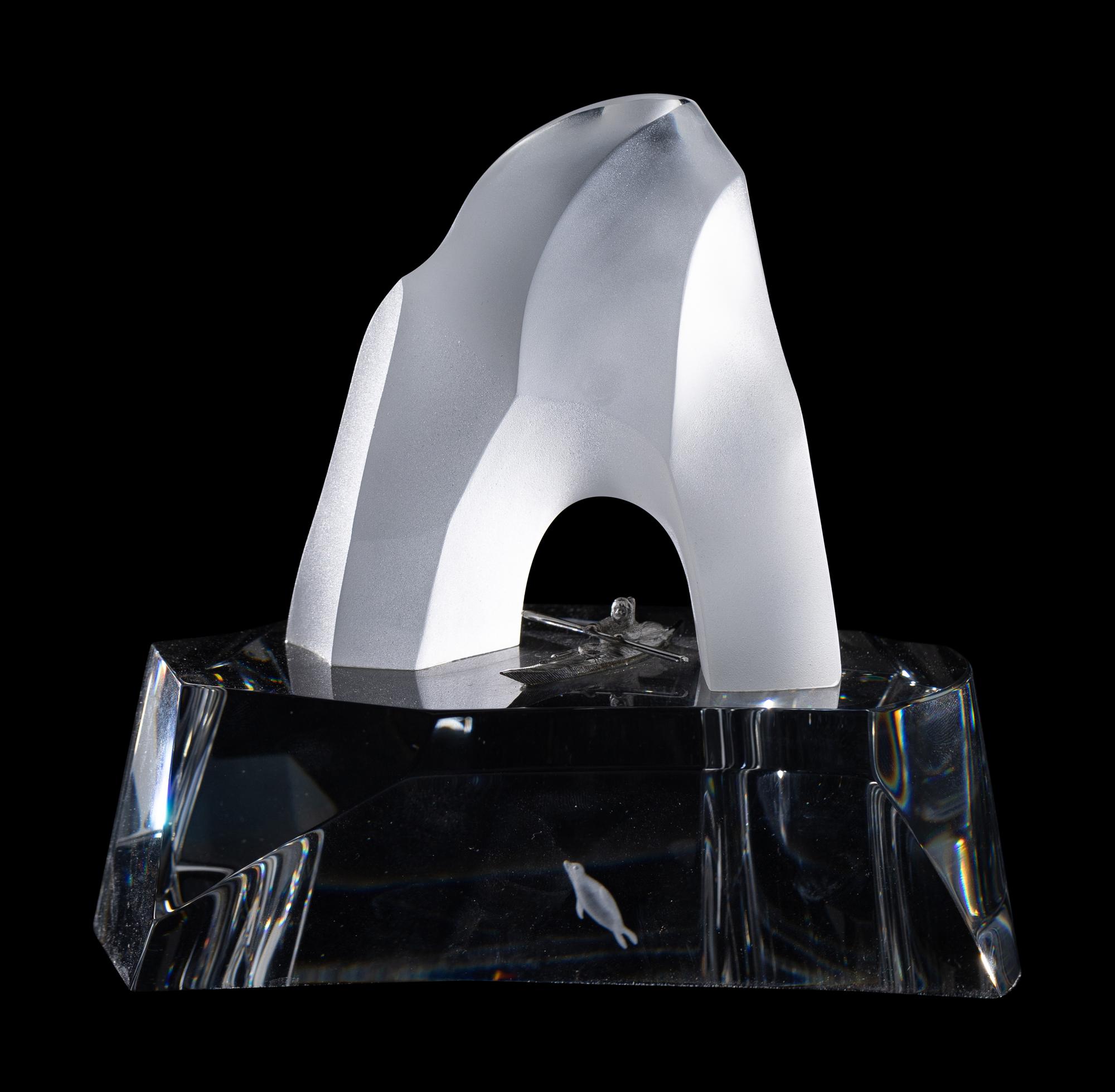 A Steuben Glass and Silver Ice Penguin Sculpture
