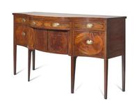 A Federal Inlaid and Figured Mahogany Serpentine Front Sideboard, New York, NY, Circa 1800